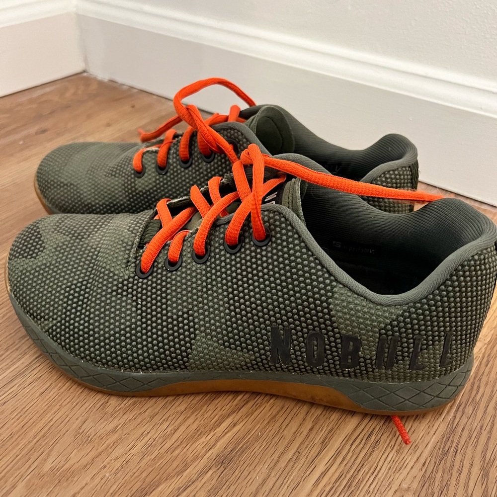 No Bull CrossFit trainers. Women’s size 8. Camo with orange laces.